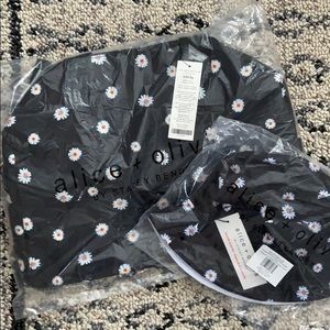 Alice and Olivia daisy duffel bag and bucket hat
